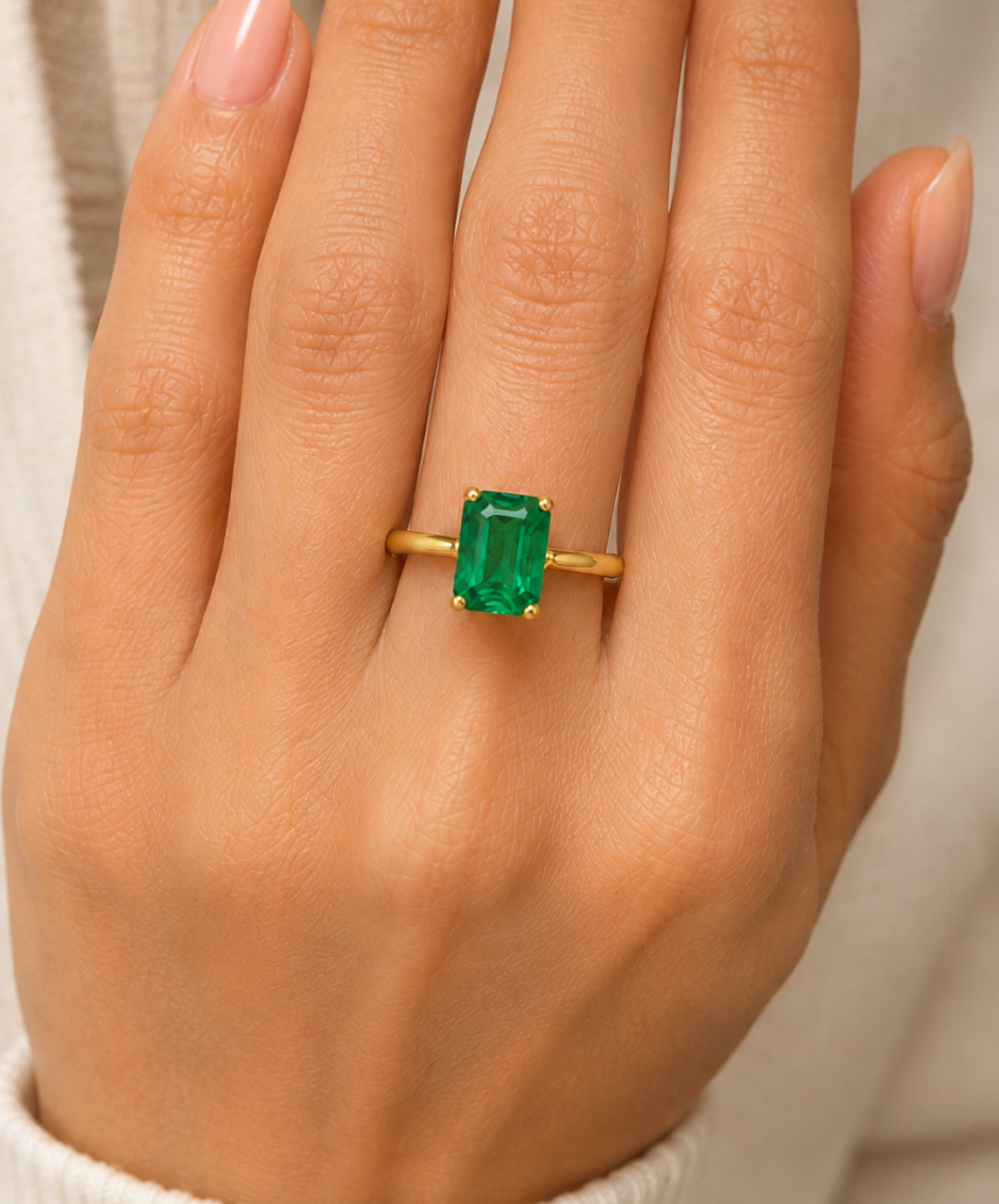 The Bishop — split shank solitaire emerald ring in 18k yellow gold